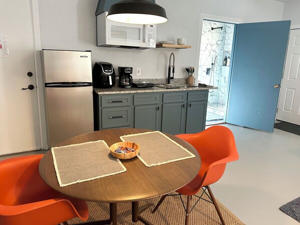 Fridge, microwave, stovetop, coffee/tea maker