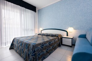 1 habitación, acceso a internet y ropa de cama