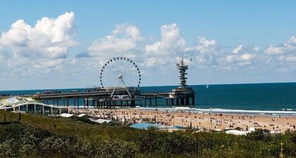 Neat chalet on child-friendly campsite close to beach, town, dunes and forest.