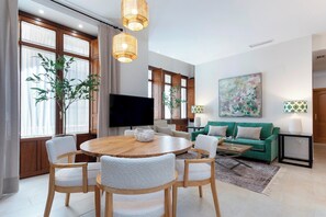 Apartment (2 Bedrooms) | Living area | 52-inch Smart TV with digital channels