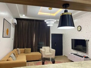Economy Apartment, Balcony, City View | Living area - Lalo's place and Apartments (Abuja)