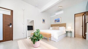 Unclassified image, 3 of 21, button - Room 16: Grand King Suite w/ Desk & Sofa Bed (San Juan)