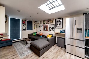 48-inch flat-screen TV with digital channels, Netflix