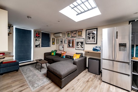 48-inch flat-screen TV with digital channels, Netflix