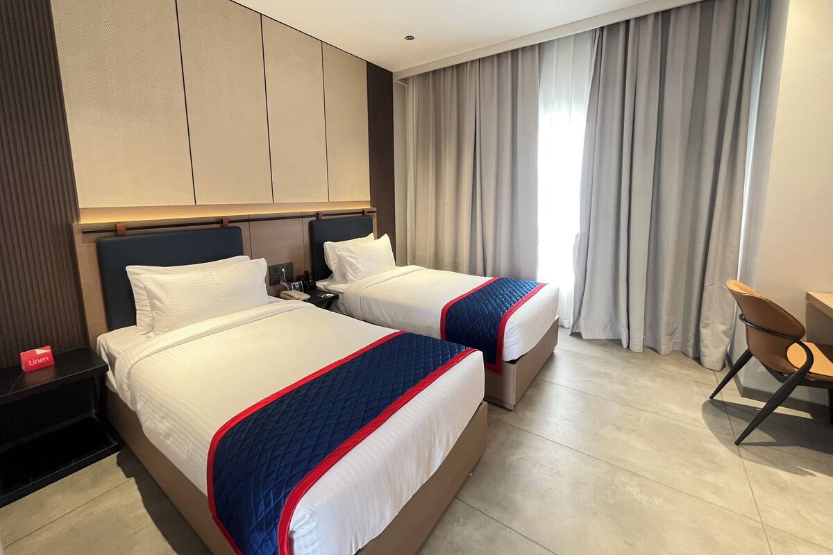 Phòng 2 giường đơn Deluxe | Bộ đồ giường cao cấp, bàn, truy cập Internet không dây miễn phí 
