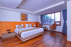 Premium Room | 1 bedroom, blackout drapes, soundproofing, free WiFi