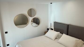 Apartamento, 2 quartos, para não fumantes, cozinha | 2 quartos, cofres nos quartos, ferros/tábuas de passar roupa