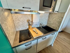 Refrigerador, microondas, parrilla de estufa y lavavajillas 