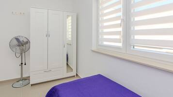 Family Apartment, Partial Sea View | 3 bedrooms, iron/ironing board, free WiFi