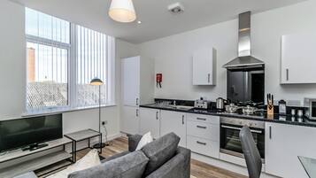 Apartment | Private kitchen | Full-size fridge, microwave, oven, stovetop