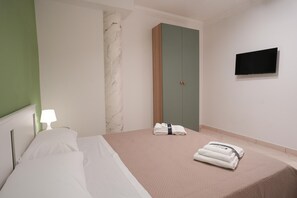 1 chambre, fer et planche Ă repasser, Wi-Fi gratuit, draps fournis