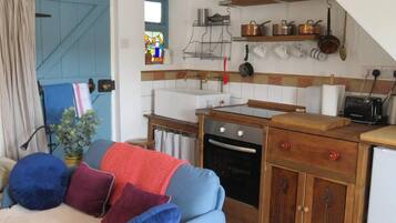 Cottage | Area soggiorno | Caminetto