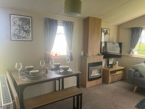 Cabin | Living area | TV, fireplace