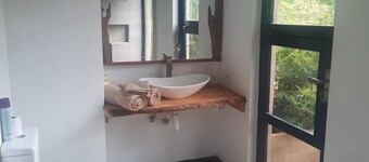 Rustic charm nestled along the peaceful banks of River Sagana & River Mathioya.