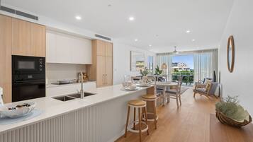 Fridge, stovetop, toaster, cookware/dishes/utensils