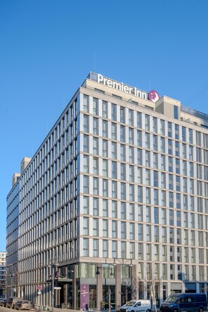 A Premier Inn hotel with a modern facade, large windows, and a prominent signage. - Premier Inn Berlin Alexanderplatz (Berlin)