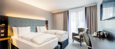 Chambre Standard double ou avec lits jumeaux | SystĂšme dâinsonorisation, accĂšs au Wi-Fi (inclus)