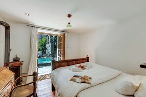 Apartemen Keluarga, beberapa kamar, 2 kamar mandi, tepi gunung (Mille Colline la Casa 2) | 2 kamar tidur dan seprai linen