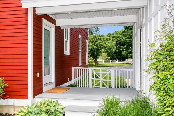 Exterior detail - Experience tranquility at The Red Farmhouse in secluded Fennville, MI, with 4 bedrooms. (Fennville)