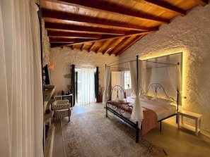 Suite, Balcony, Pool View | Minibar, in-room safe, free WiFi, bed sheets