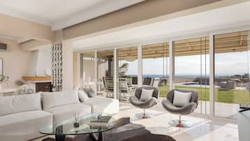 Villa, Sea View | Living room | 50-inch Smart TV with satellite channels, Netflix, streaming services