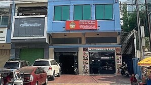 A multi-story building with a prominent red sign for Galaxy RS Hotel & Restaurant. - GALAXY-RS-HOTEL (Phnom Penh)