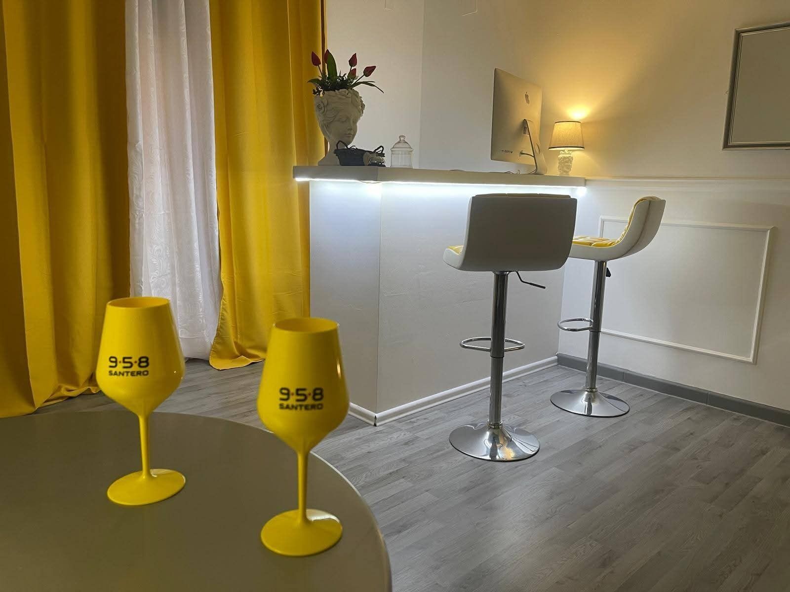 Deluxe Suite | Living area | 60-inch Smart TV with digital channels