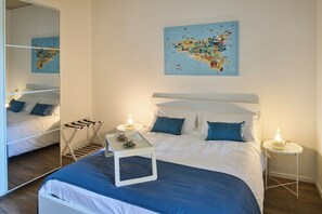 1 bedroom, desk, iron/ironing board, travel cot