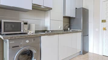 Studio, Balcony | Private kitchen