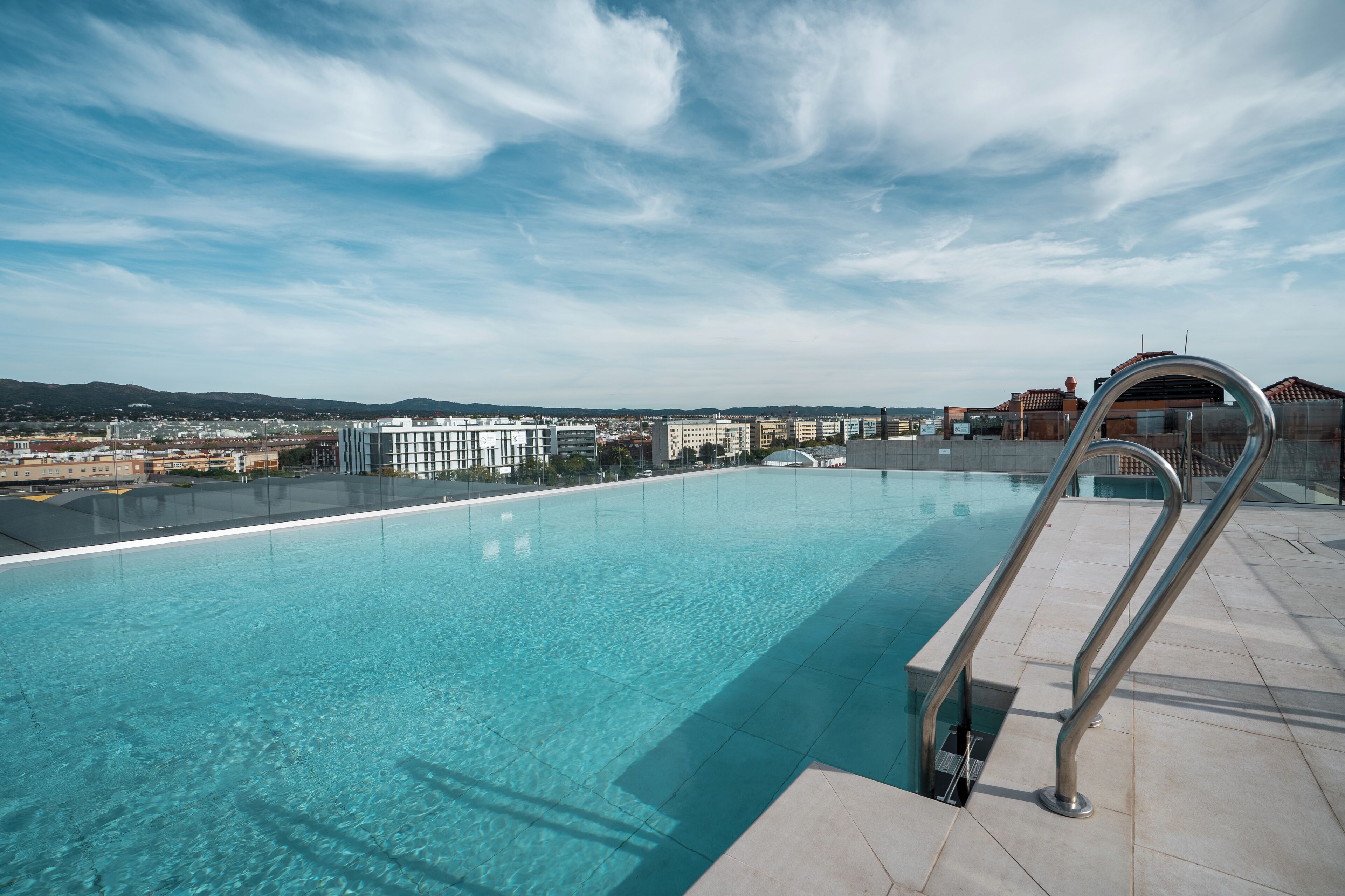 Seasonal outdoor pool, pool umbrellas, sun loungers