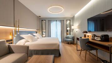 Habitació superior | Minibar, caixa forta a l'habitació, wifi gratuïta i roba de llit