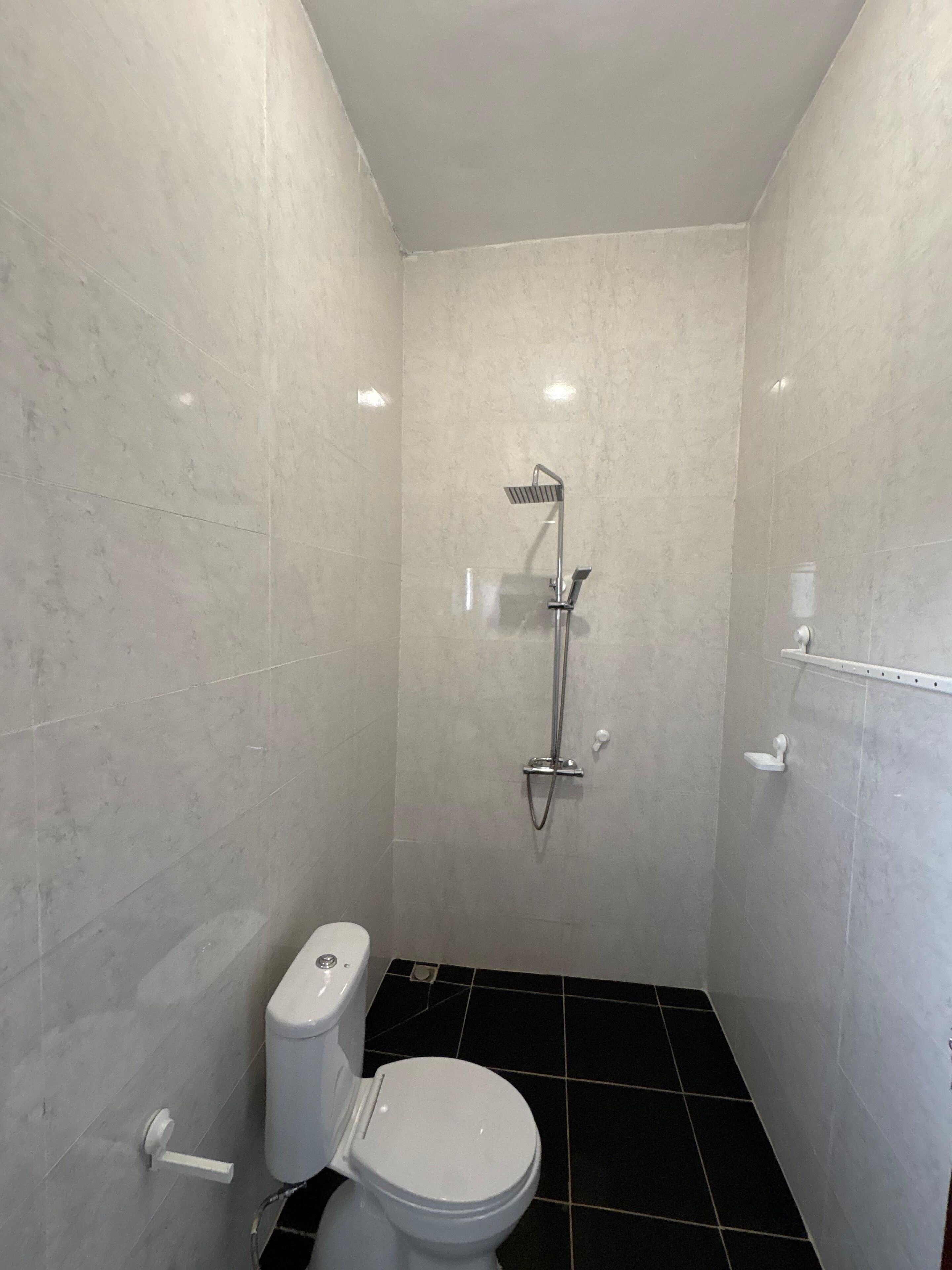 Shower, towels, soap, toilet paper