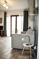 Apartment, Balcony, Lake View | Living area