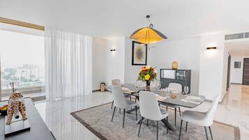 Executive Suite Ocean View | Living area | 42-inch Smart TV with digital channels