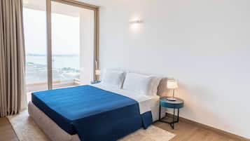 Premium bedding, down comforters, memory foam beds, minibar