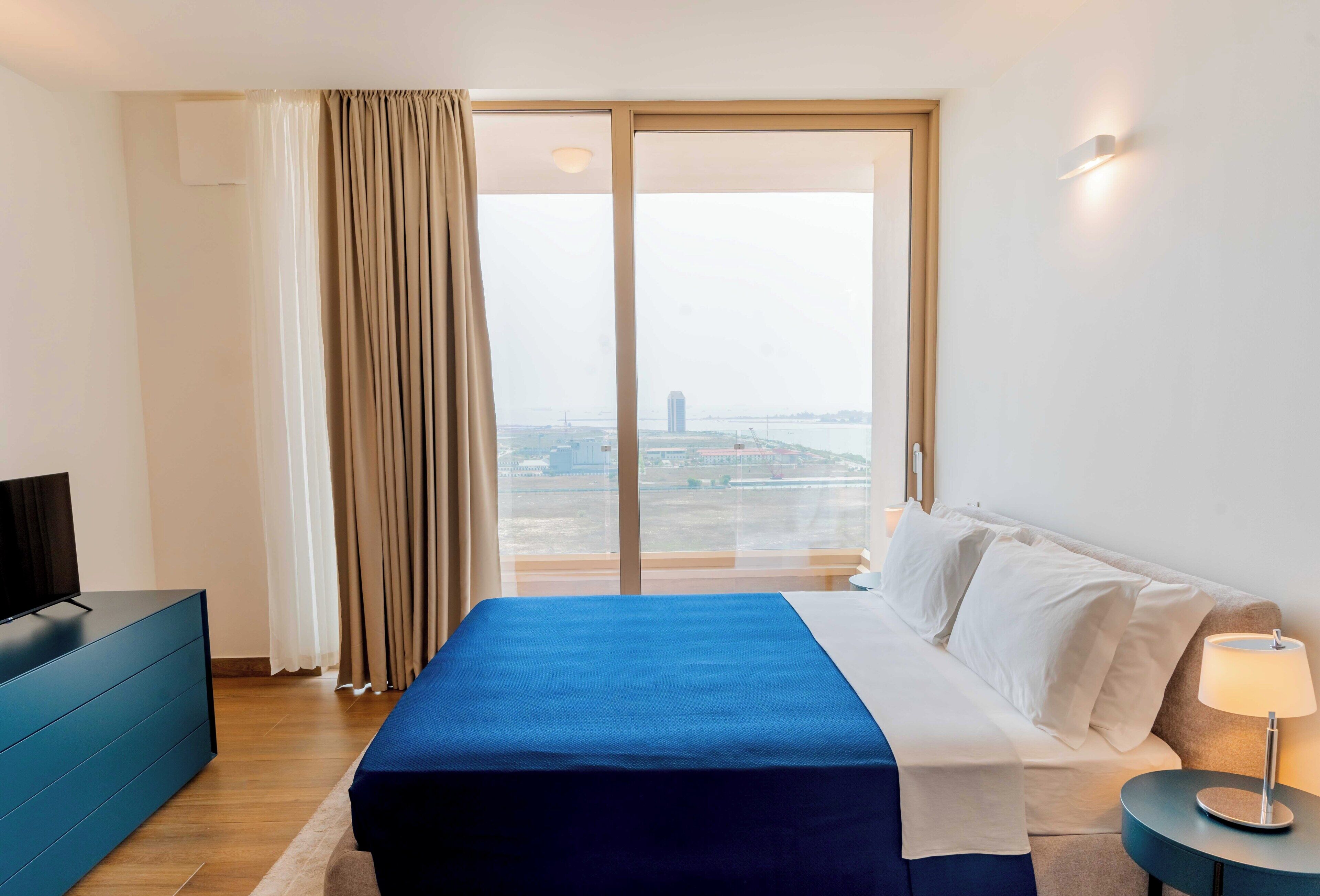 Premium bedding, down comforters, memory foam beds, minibar