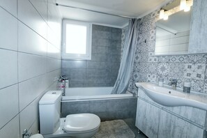 Hair dryer, towels, soap, toilet paper