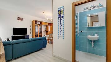 Standard Apartment, 2 Bedrooms, 2 Bathrooms (Garda Lake View From The 7th Floor) | Living area | 21-inch Smart TV with cable channels