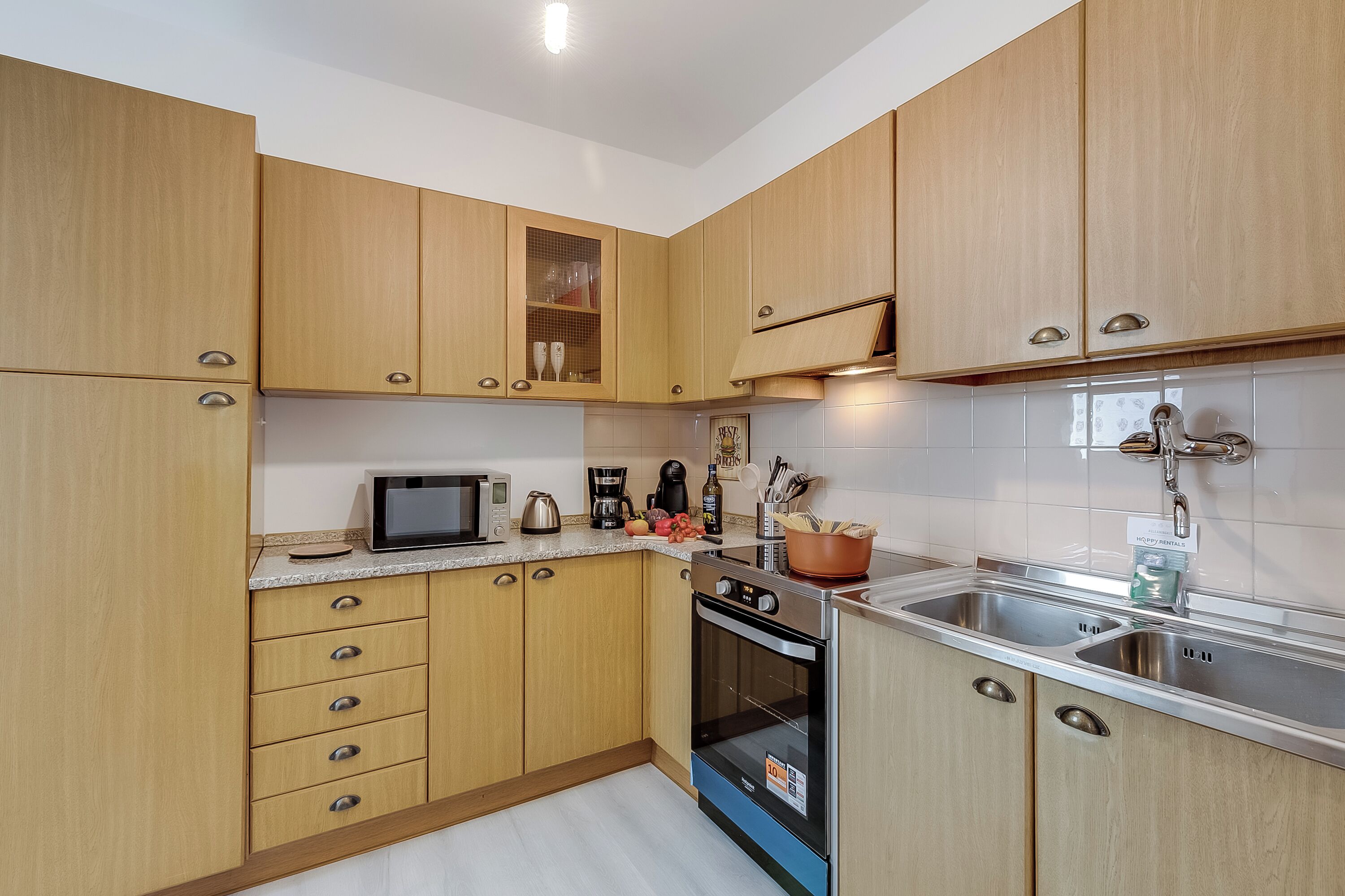 Standard Apartment, Multiple Bedrooms, 2 Bathrooms (Garda Lake View From The 7th Floor) | Private kitchen | Fridge, microwave, oven, stovetop