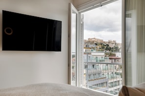 Appartement Familial, balcon, vue ville | 4 chambres, draps en coton égyptien, literie de qualité supérieure