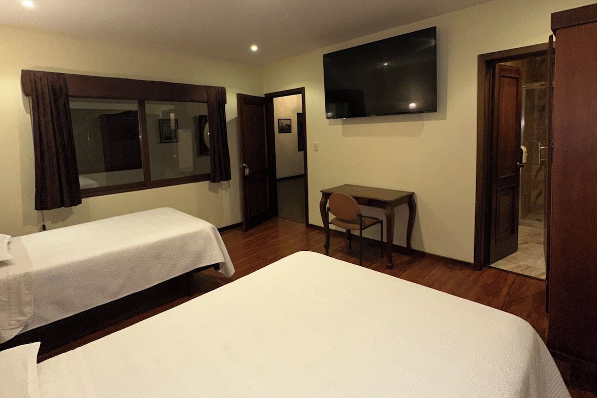 Desk, laptop workspace, free WiFi, bed sheets