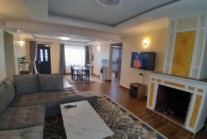 Family Villa, Balcony, Garden View | Living area | 32-inch Smart TV with digital channels - Loma Homes Ol Kalou (Ol Kalou)