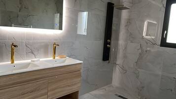 Shower, hair dryer, towels, soap