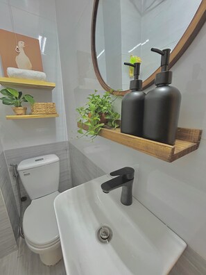 Jetted bath, hair dryer, towels, soap