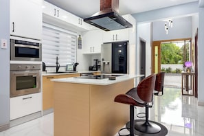 Deluxe Villa, Balcony, Garden View | Private kitchen - Coastal Escape in Tower Isle BeachNearby (Tower Isle)