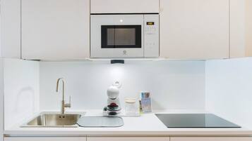 Fridge, microwave, coffee/tea maker, toaster