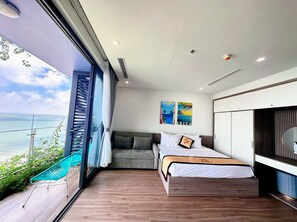 エリート スタジオスイート | 高級寝具、セレクト コンフォート製ベッド、客室ごとに異なるインテリア、デスク