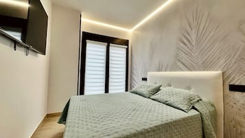 1 dormitorio, tabla de planchar con plancha, wifi gratis y ropa de cama
