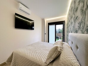 2 slaapkamers, een strijkplank/strijkijzer, gratis wifi, beddengoed
