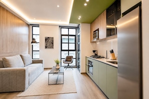 Standard Apartment, Balcony | Private kitchen | Microwave, oven, dishwasher, coffee/tea maker -  Casa Indigo Apartahotel Parque 93 (Bogotá)